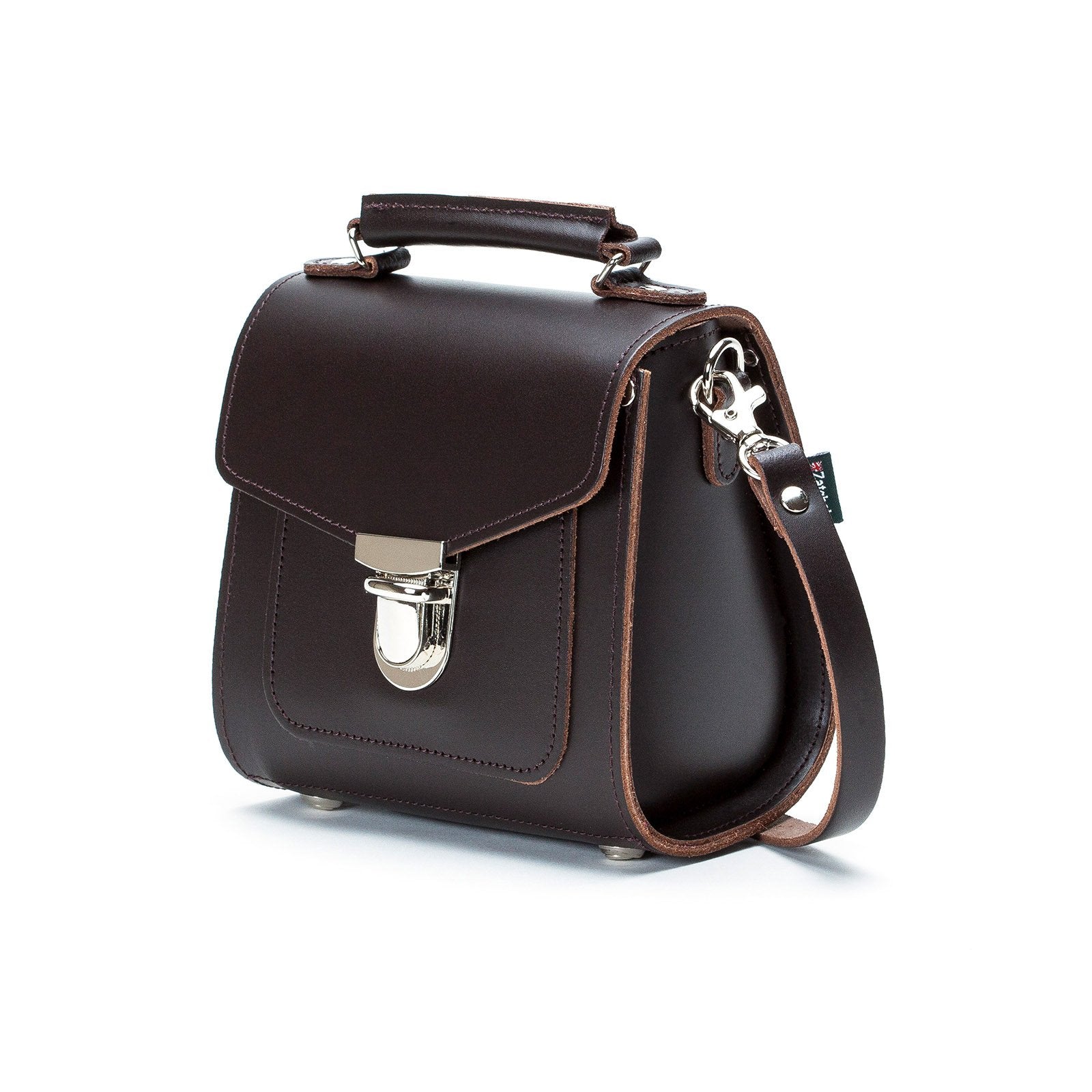 Chic Dark Brown Handmade Leather Sugarcube Handbag displayed elegantly with an adjustable strap, showcasing luxury craftsmanship.