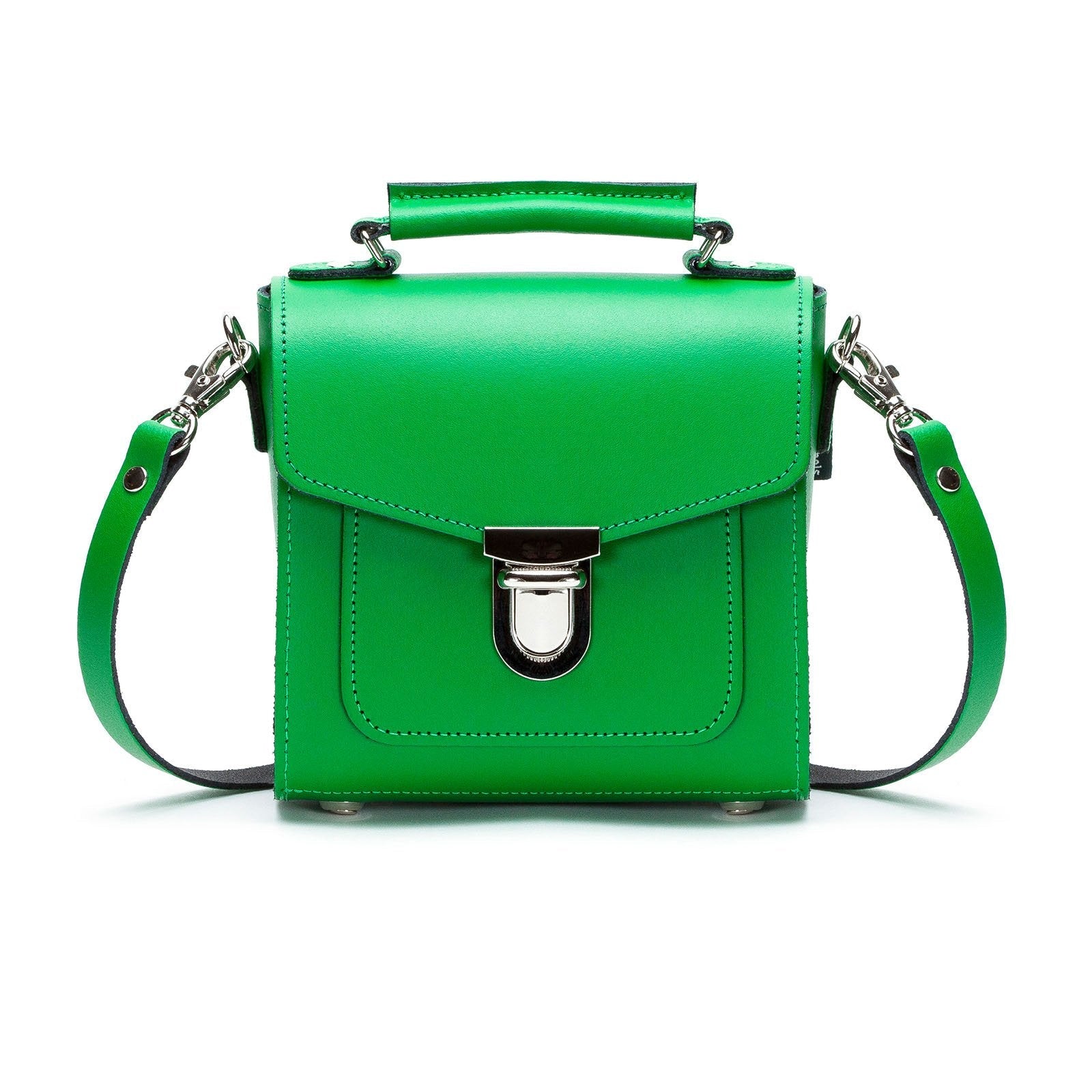 Handmade green leather Sugarcube handbag by Zatchels, showcasing a luxurious design with adjustable strap for versatile styling options as a crossbody, shoulder bag, or chic clutch.