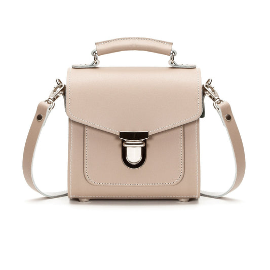 Handmade Iced Coffee Leather Sugarcube Handbag showcasing elegant design and unique push-lock closure, perfect for classy occasions.