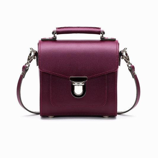 Handmade Marsala Red Leather Sugarcube Handbag showcasing its premium craftsmanship and luxurious design with a trendy push lock closure.