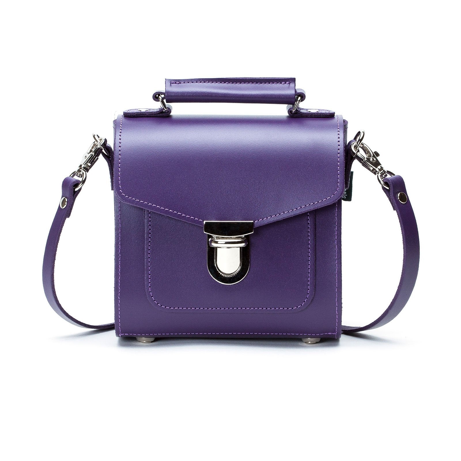 Exquisite Purple Handmade Leather Sugarcube Handbag by Zatchels, showcasing its luxurious design, adjustable strap, and elegant silhouette.