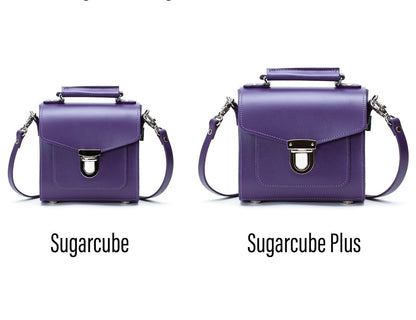 Adjustable Strap of the Purple Handmade Leather Sugarcube Handbag, highlighting versatility in carrying options for a sophisticated look.