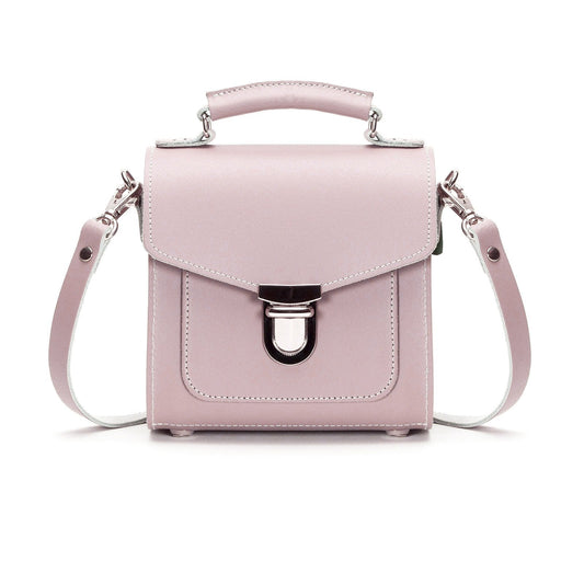 Handmade Leather Sugarcube Handbag in Rose Quartz featuring an elegant design with trendy shape and sophisticated push lock closure.