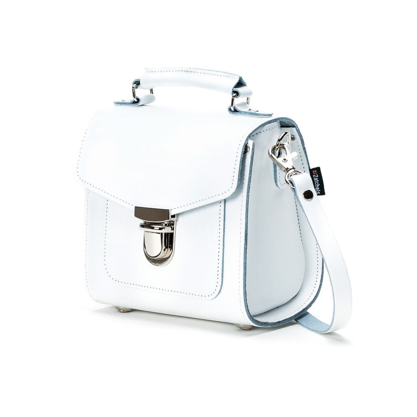Close-up view of the chic Handmade White Leather Sugarcube Handbag, highlighting its exquisite craftsmanship and stylish push-lock closure.