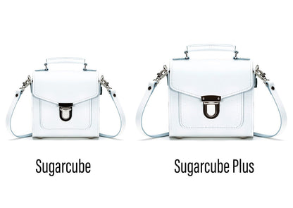 Versatile Handmade White Leather Sugarcube Handbag with adjustable and detachable strap, designed for luxury and practicality in a contemporary sugarcube shape.