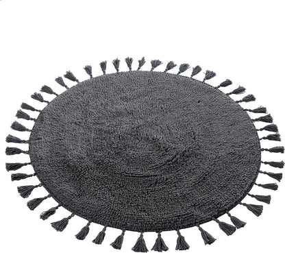 Tasselled edges of the OLIVIA ROCCO Round Bath Mat, emphasizing its sophisticated design and luxurious style, perfect for enhancing bathroom aesthetics.