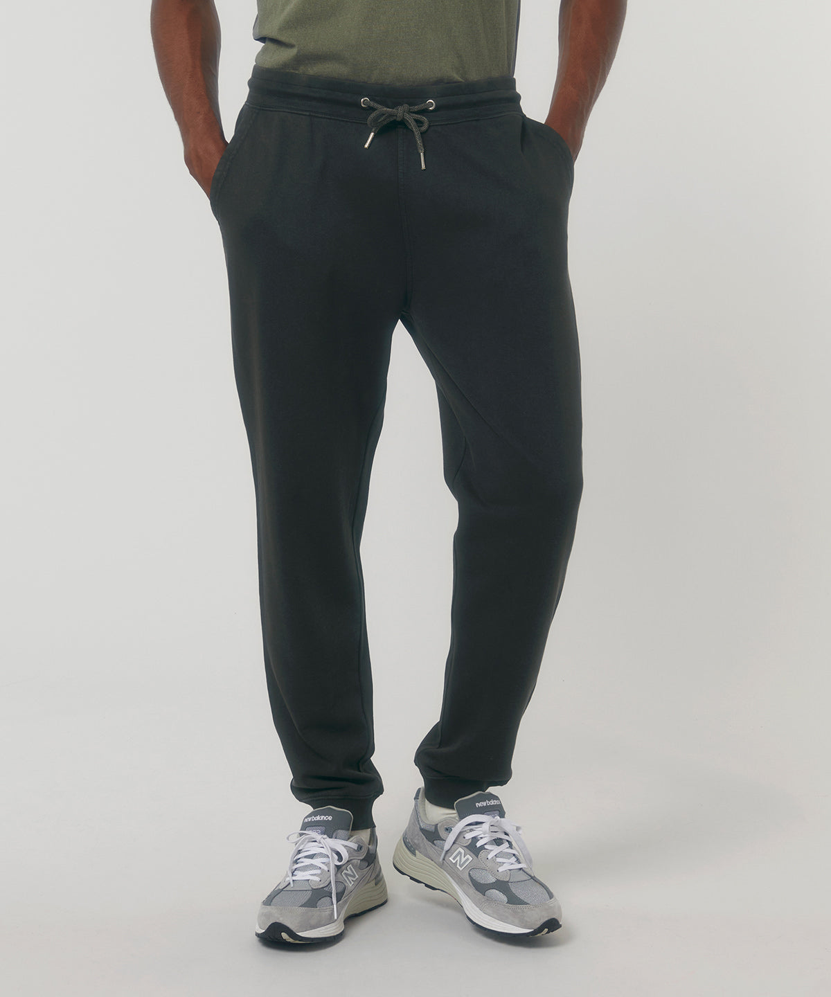 Luxurious unisex organic vintage jogger pants in a unique aged finish, crafted from 100% ring-spun combed cotton, offering comfort and a relaxed fit for sizes XXS to 3XL.