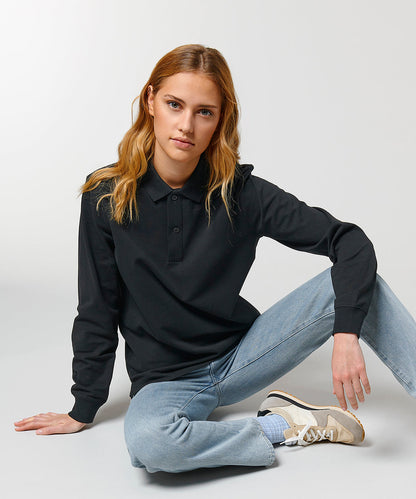 Close-up detailing of the elegant organic cotton long sleeve polo shirt, showcasing the refined craftsmanship and premium fabric.