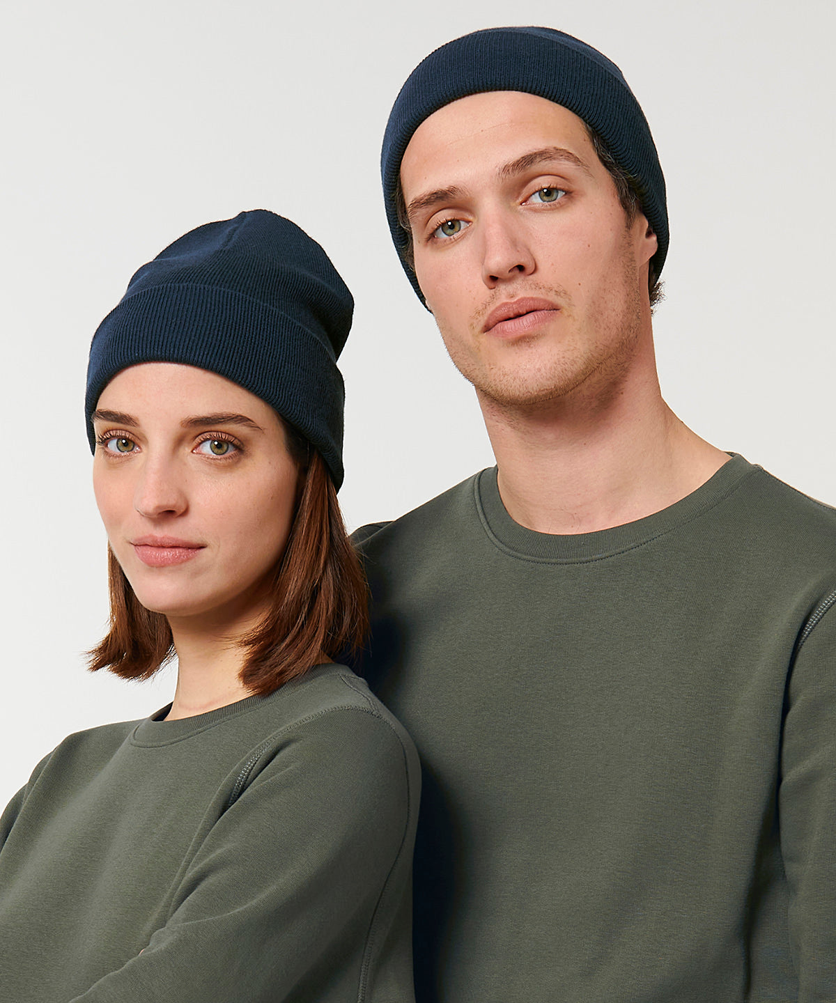 Sophisticated organic cotton beanie with a foldable brim, embodying luxury fashion while promoting sustainable materials.