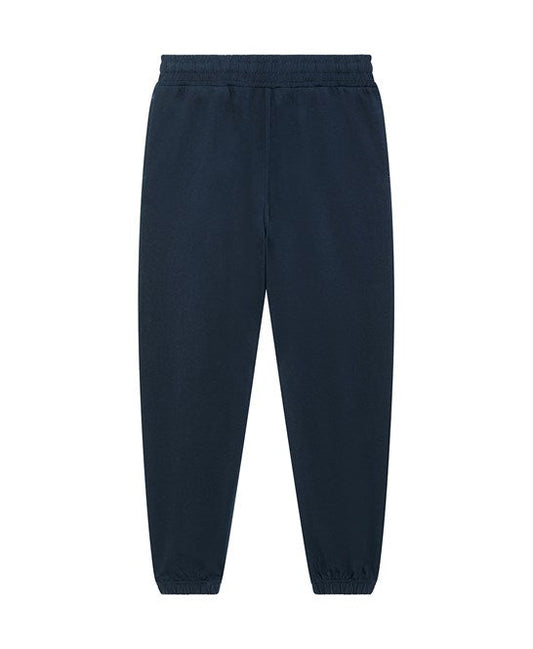 Close-up view of eco-friendly organic cotton jog pants, illustrating the superior softness and high-quality fabric for a luxe lounging experience.