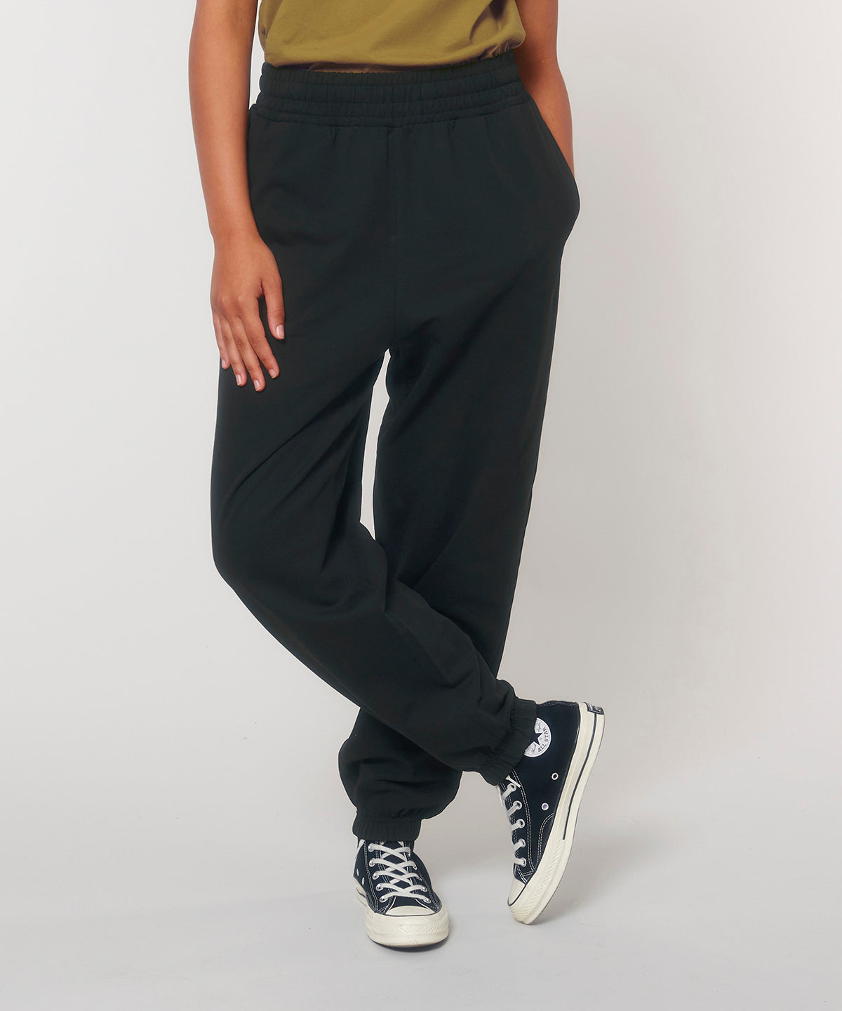 Luxury relaxed jog pants made from soft organic cotton, designed for both men and women, featuring a comfortable laid-back fit perfect for casual occasions.