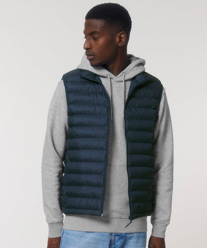 Mens puffer bodywarmer worn casually, illustrating how this sustainable piece enhances comfort and style in every ensemble.