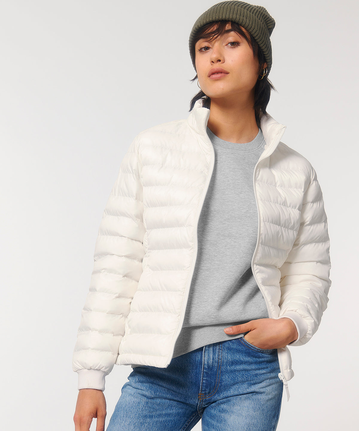Model wearing the elegant Women's Recycled Polyester Puffer Jacket, demonstrating its stylish design and functional features for winter.