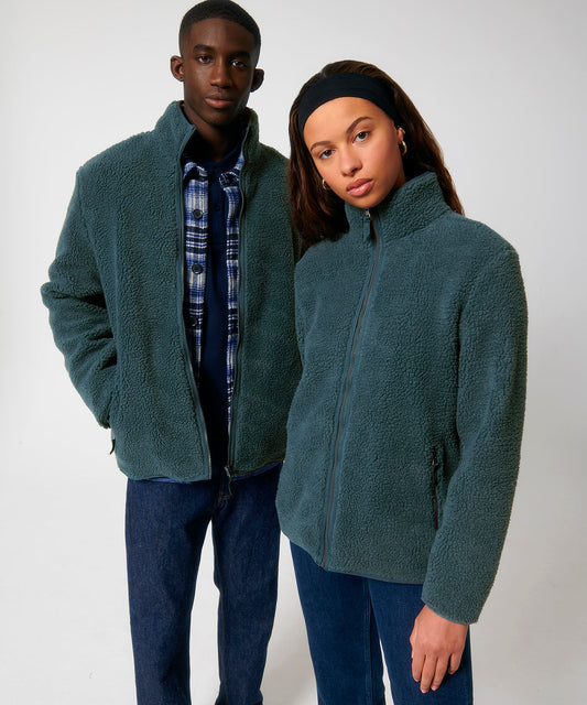 Luxurious unisex recycled sherpa jacket featuring a soft and fluffy texture, ideal for eco-conscious warm layering.