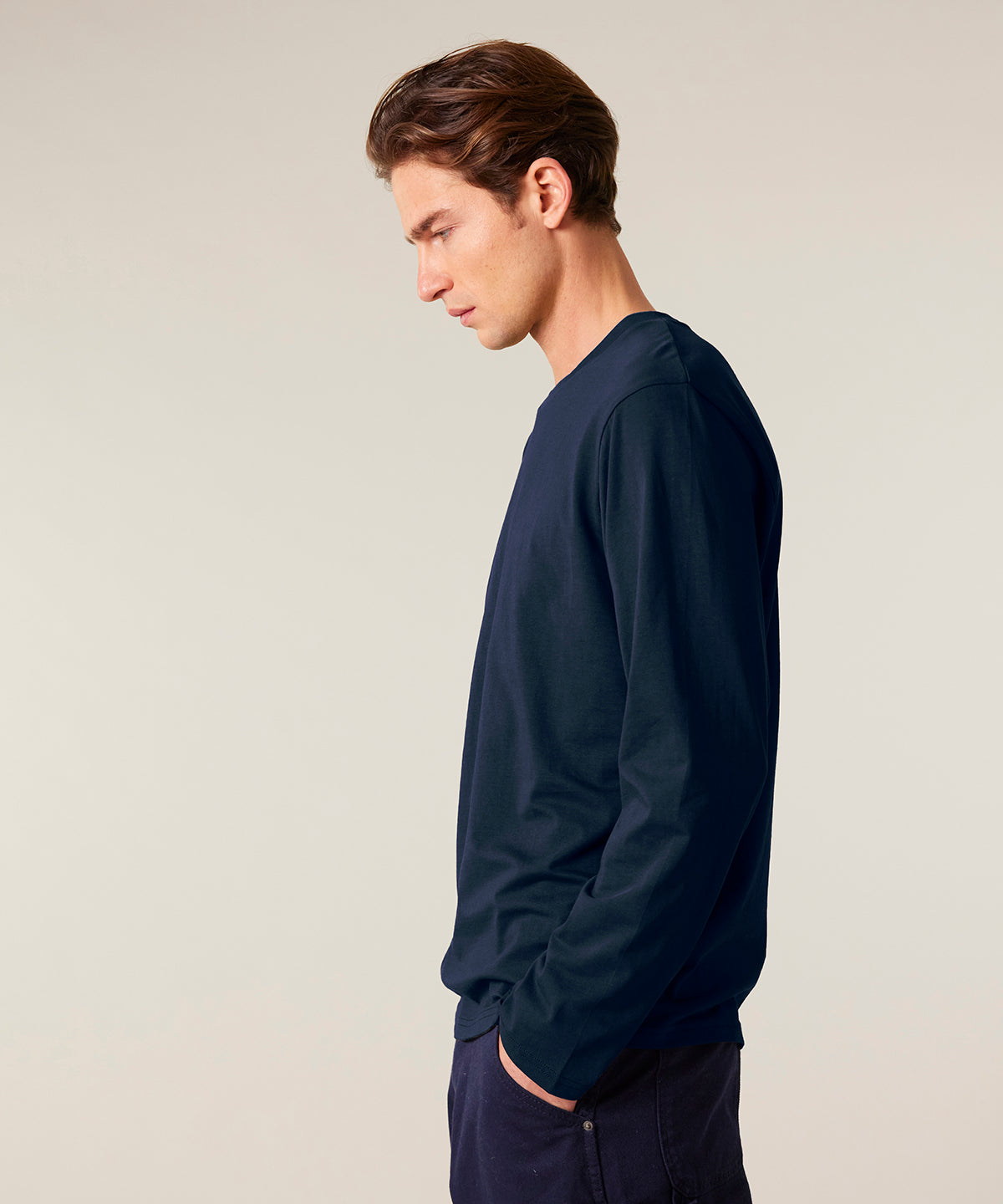 Men's luxury organic long sleeve t-shirt styled for versatile layering, perfect for both casual and formal occasions.