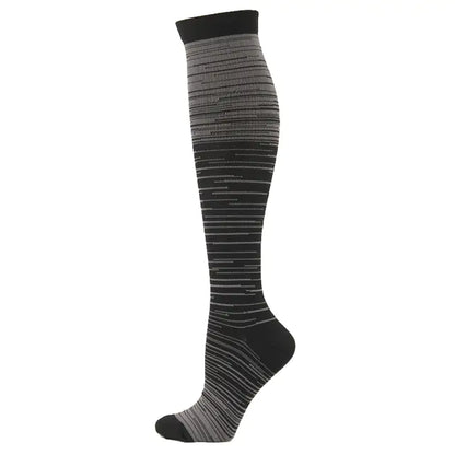 Elegant Men's and Women's activewear Flightwear Compression Stockings showcasing a sophisticated black and grey striped pattern, perfect for achieving peak athletic performance.