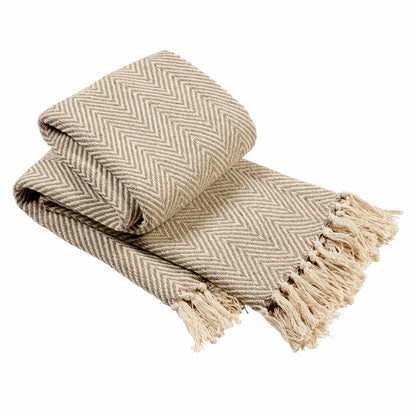 Beautifully designed Tangier Super Soft Throw Blanket with a premium recycled cotton texture and elegant tassels, perfect for adding warmth and style to your home.