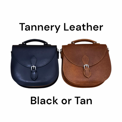 Spacious interior of the Handmade Tan Tannery Leather Saddle Bag, highlighting ample storage and elegant design, perfect for everyday essentials.