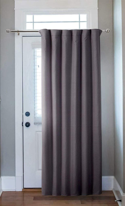 Stylish installation of Capri Thermal Door Curtain in a beautifully decorated room, highlighting its aesthetic appeal and functionality in luxurious home décor.