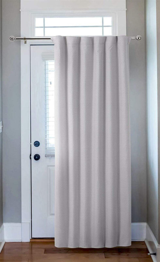 Close-up of Capri Thermal Door Curtain fabric revealing double face fabric with quilting, ensuring superior insulation and elegant drape for sophisticated interiors.