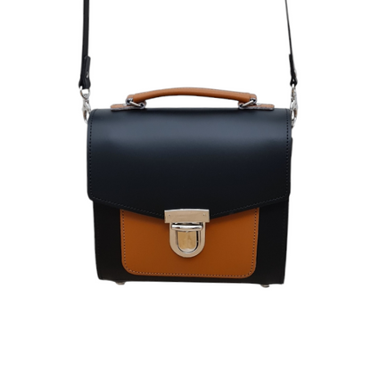 Handmade Leather Sugarcube Handbag in Black and Burnt Orange, showcasing its stylish two-tone design and high-quality leather craftsmanship, ideal for luxury fashion enthusiasts.