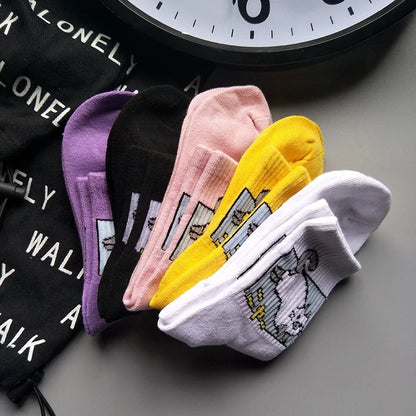 Stylish Hip Hop Long Socks for Women & Girls in an assortment of vibrant colours including pink, yellow, and purple, showcasing unique cartoon graphics for a fun and trendy look.