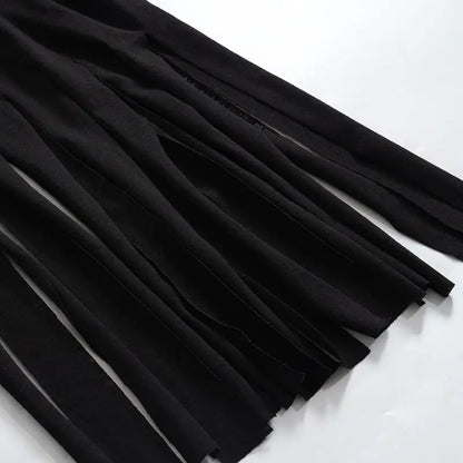 Close-up view of tassel detailing on the Women's ODB Graphic Print Tassel Tee, showcasing the high-quality stretchy fabric that enhances chic street style.