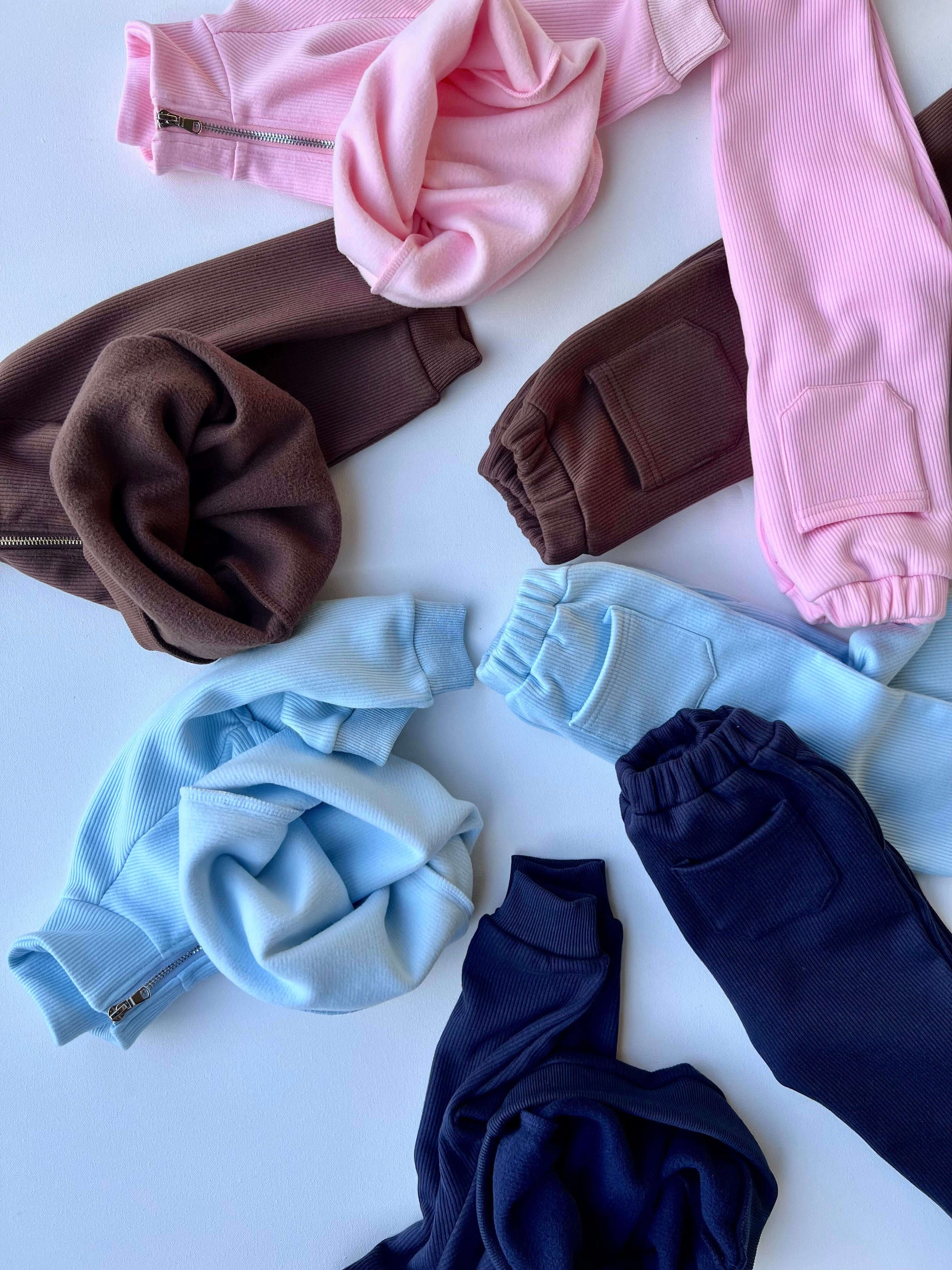 Chic and comfortable Frost Blue Ribbed Cotton Fleece Tracksuit for children ages 1-10 from DreamBuy, highlighting luxury and practicality.