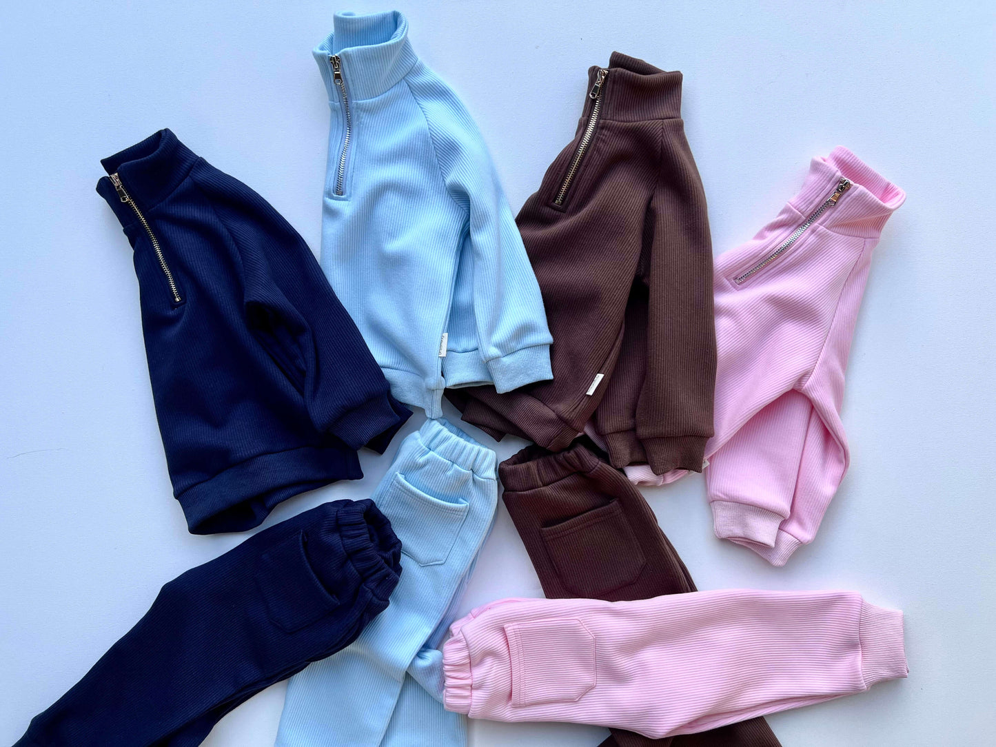 Durable and stylish Frost Blue Ribbed Cotton Fleece Tracksuit for Kids offered by DreamBuy, ideal for everyday wear and active lifestyles.