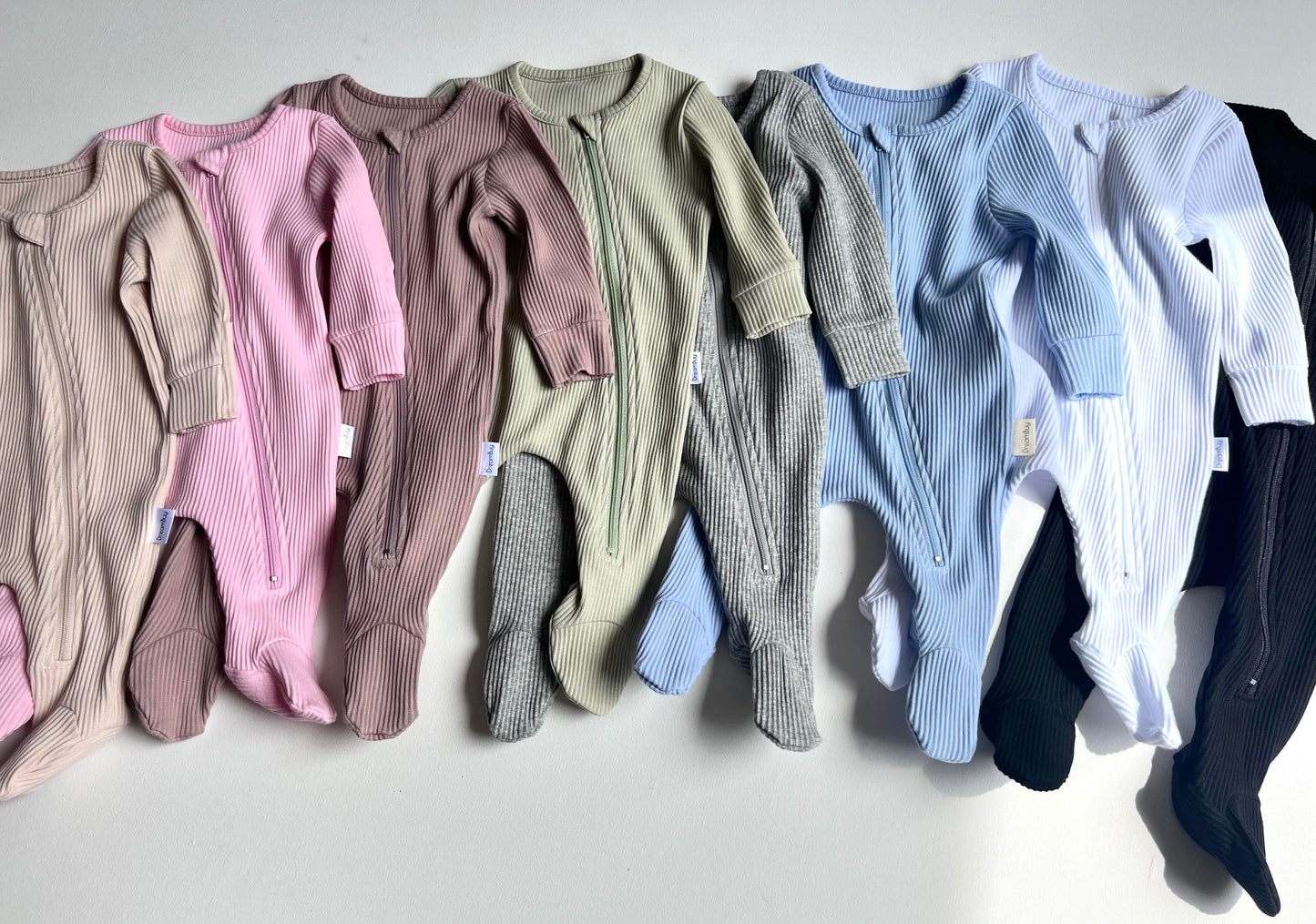 DreamBuy Luxury Sage Zip Sleepsuit displayed with fold-over mitts and boots, showcasing its unique features for newborns.