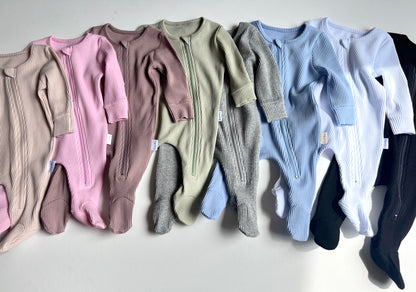 DreamBuy Luxury Sage Zip Sleepsuit displayed with fold-over mitts and boots, showcasing its unique features for newborns.