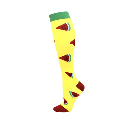 Women's Knee Length Compression Travel Socks featuring a cheerful watermelon slice pattern, perfect for adding flair while ensuring comfort and circulation.