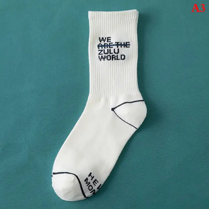 Luxurious Women's Tie-Dye Middle Tube Socks in pristine white with bold graphic text, providing a chic and trendy addition to elevate your style.