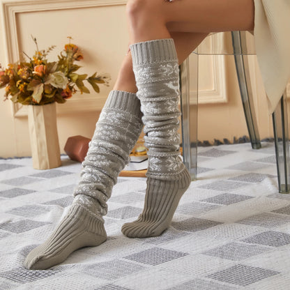 Cozy grey Sexy reindeer Stockings with intricate designs, elegantly styled on a model, perfect for adding warmth and charm to winter outfits.