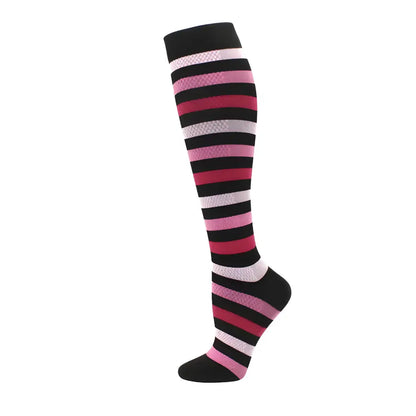 Chic Women's Knee Length Compression Travel Socks featuring elegant black, pink, and white striped patterns, ideal for comfort, style, and circulation.