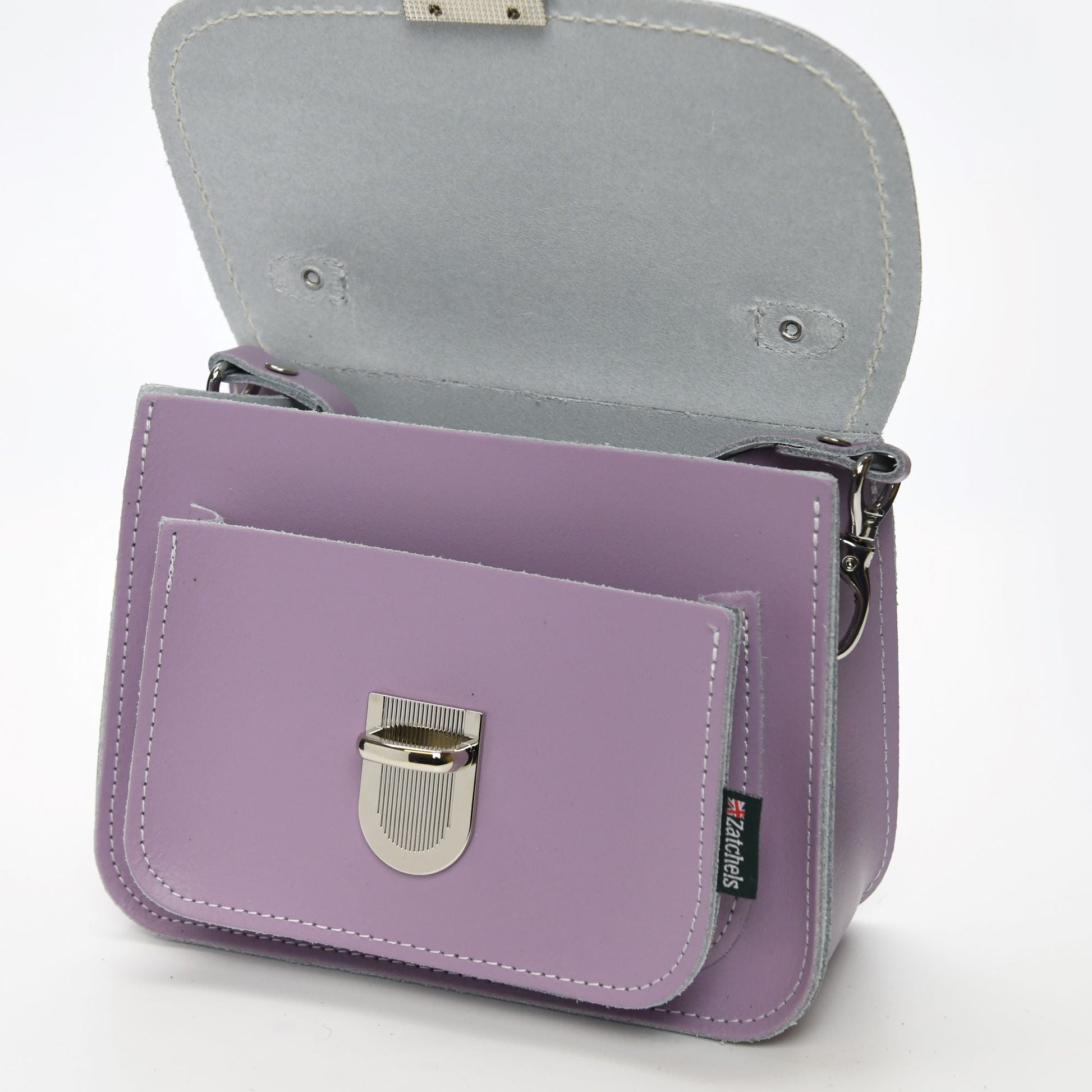 Luna Handmade Pastel Violet Leather Bag displayed with detachable shoulder strap, illustrating versatile carrying options and chic pastel hue to enhance any outfit.