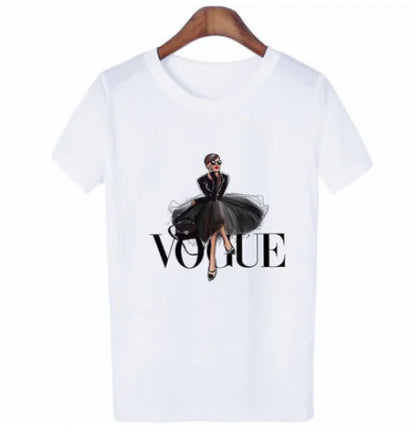 Luxury women's white oversized T-shirt featuring a stylish letter print design, showcasing a fashionable figure in a black tulle skirt with the word 'VOGUE' emblazoned in bold lettering.