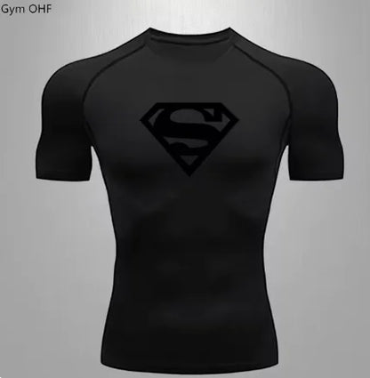 Sleek men's black compression top adorned with a subtle black superhero logo, tailored for optimum comfort and performance.