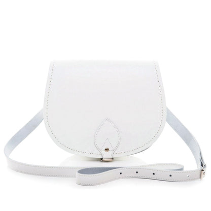 Exquisite Handmade White Leather Saddle Bag featuring adjustable crossbody design, crafted in premium leather with contrasting stitching, perfect for stylish everyday use. Available in two sizes and customizable with inner engraving.