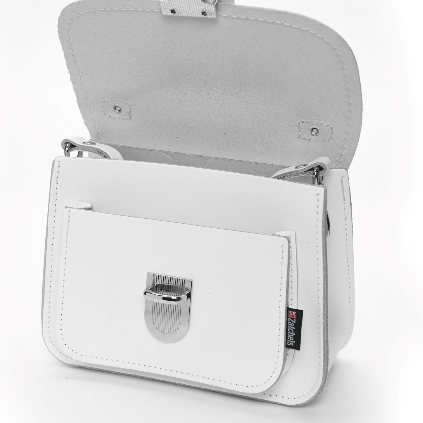 Versatile Luna Handmade White Leather Bag displayed as a chic clutch, illustrating its sophisticated design perfect for any occasion.