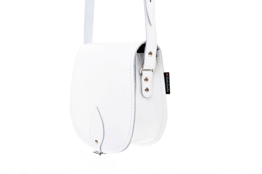 Handmade White Leather Saddle Bag featuring adjustable crossbody straps, crafted from premium leather with a classic design, perfect for elegant outings and customisable for a personal touch.