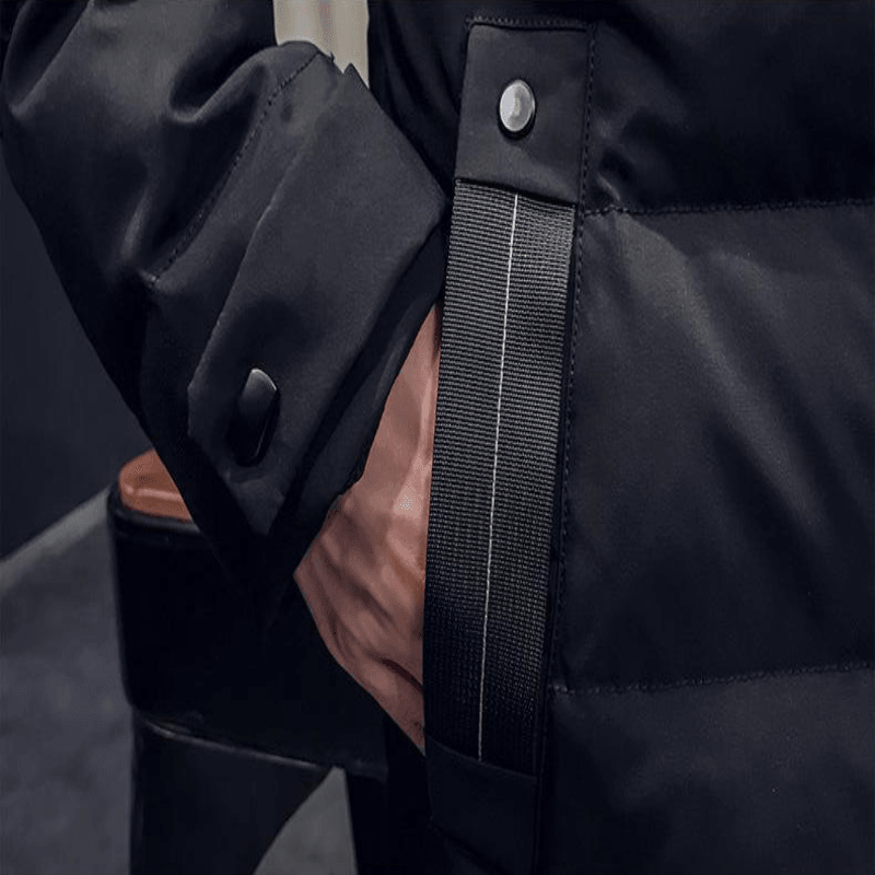 Luxurious men's mid-length hooded padded jacket in black, showcasing stylish design and premium quality material, perfect for casual and elegant occasions.