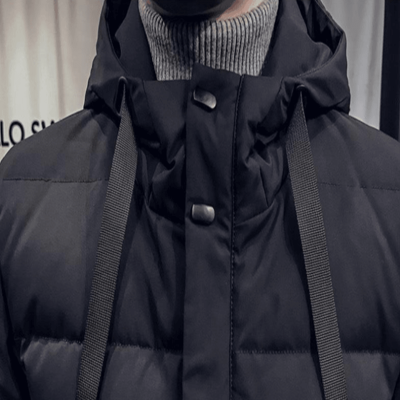 Close-up of the men's stylish mid-length hooded jacket, highlighting premium material and exquisite craftsmanship.