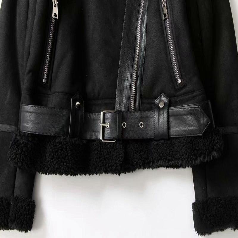 Fashion-forward black suede winter jacket on display, combining comfort and style with plush lamb wool lining for women.