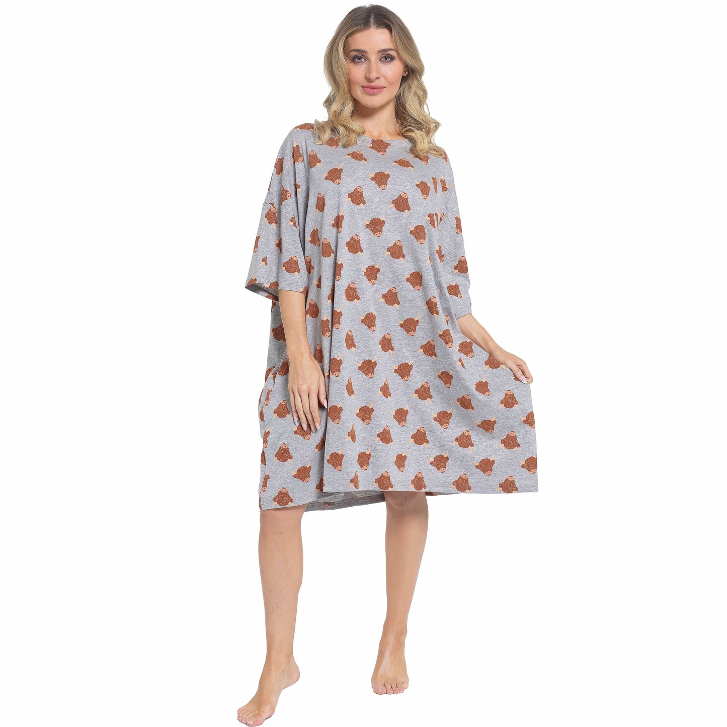 Elegant Highland Cow Cream Baggy Nighty Dress, an oversized 100% cotton short-sleeved nightshirt featuring unique highland cow prints, perfect for luxury lounging and restful sleep.
