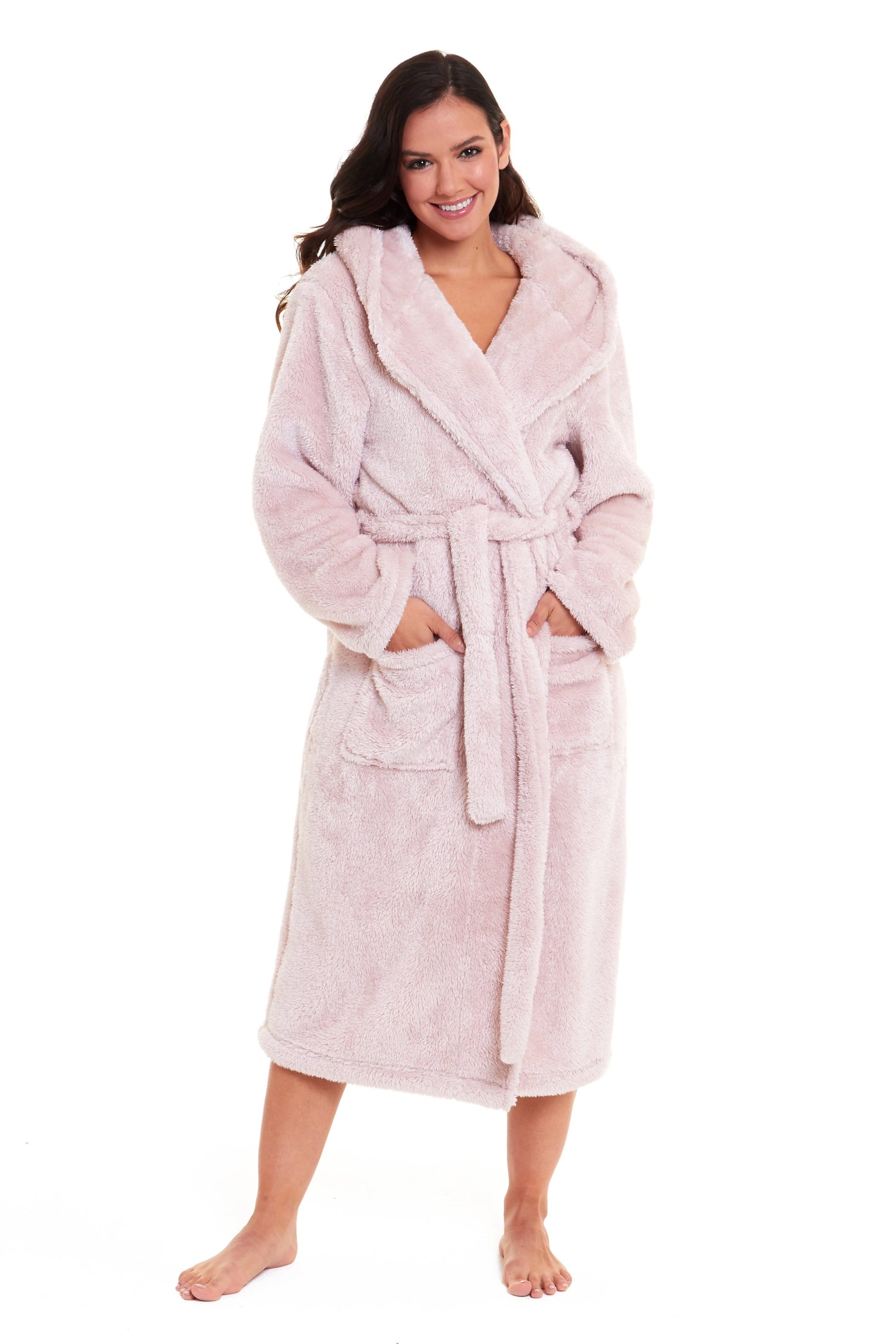 Model wearing the women's pink snuggle fleece hooded robe, exuding comfort and style, perfect for lounging at home.