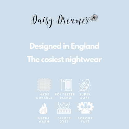 Close-up detail of the women's pink snuggle velvet touch fleece hooded robe highlighting the soft fabric and chic hood, embodying luxury and warmth for a premium at-home lounging experience.