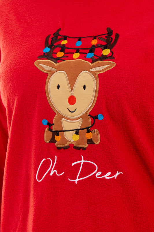 Stylish contrasting patterned bottoms of Women's Ultra-Soft Polar Fleece Pyjama Set featuring elegant festive reindeer motif, ideal for sophisticated winter lounging.