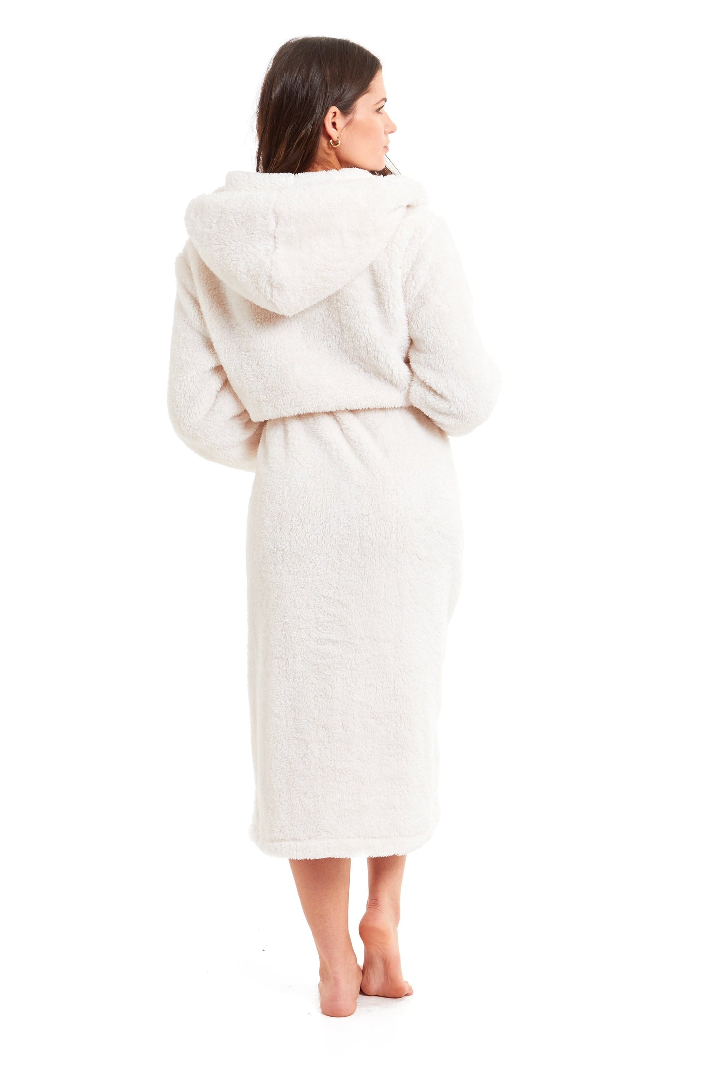 Lifestyle image of a woman wearing the Cream Snuggle Fleece Robe, embodying style and warmth for relaxing home moments.