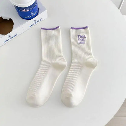 Elegant White Embroidered Socks for Women with Unique Japanese-Style Font Design showcasing purple accents on the cuff, ideal for a trendy and stylish look.